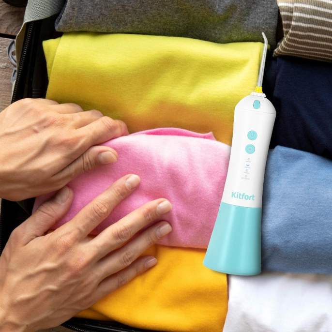 Ирригатор KitFort КТ-2958-3 цвет:бирюзовый и белый