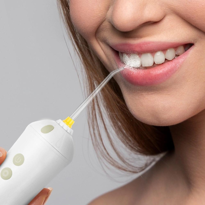 Ирригатор Kitfort КТ-2958-2 портатив. 4насад. зеленый/белый