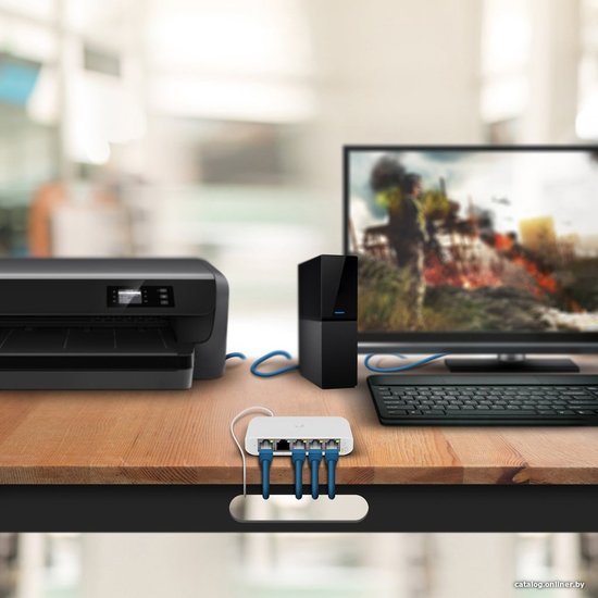 Настраиваемый коммутатор Ubiquiti UniFi Switch Flex Mini настраиваемый (smart), настольный, матрица 5 Гбит/с, 7.44 Mpps, 5xGbit, PoE