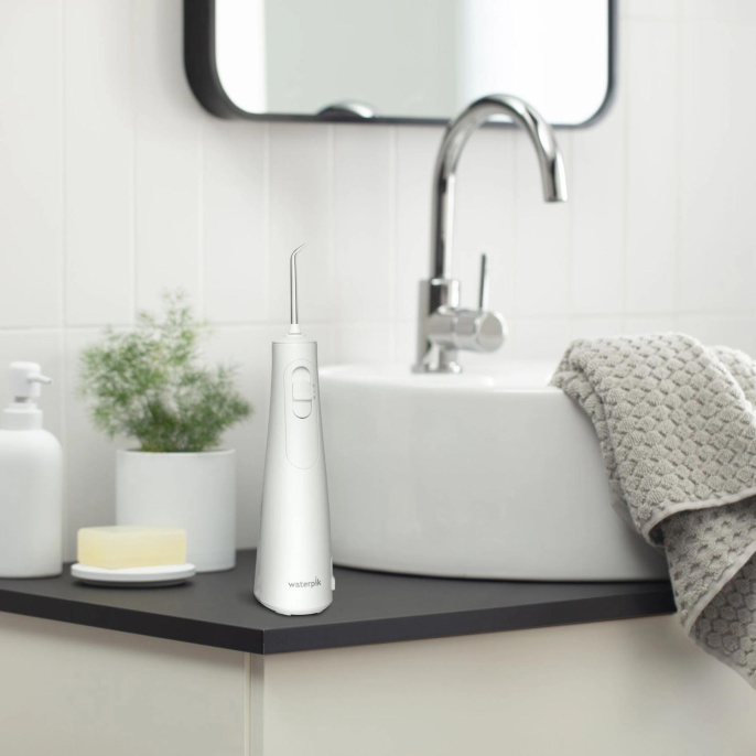 Ирригатор Waterpik WF-21 портатив. импульсн. 2насад. белый (WF21)