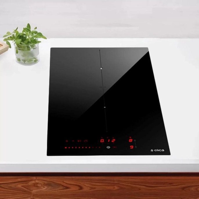 Индукционная варочная панель ELICA RATIO 302 PLUS BL, 30 см, сенсорное управление, 9 уровней мощности, Bridge zone, Booster, индикатор остаточного тепла, распознование посуды, пауза, подогрев, таймер, цвет черный