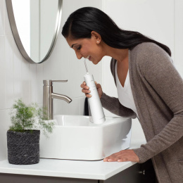 Ирригатор Waterpik WF-21 портатив. импульсн. 2насад. белый (WF21)