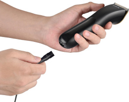 Машинка для стрижки Polaris PHC 2500 черный 3Вт насадок в компл:6шт