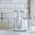 Ирригатор Waterpik WP-160 Ultra Plus импульсн. 7насад. белый