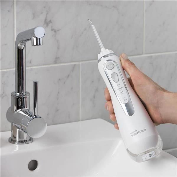 Ирригатор Waterpik WP-560ЕU портатив. импульсн. 4насад. белый